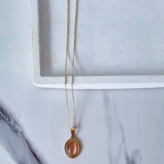 Oval peachy pendant