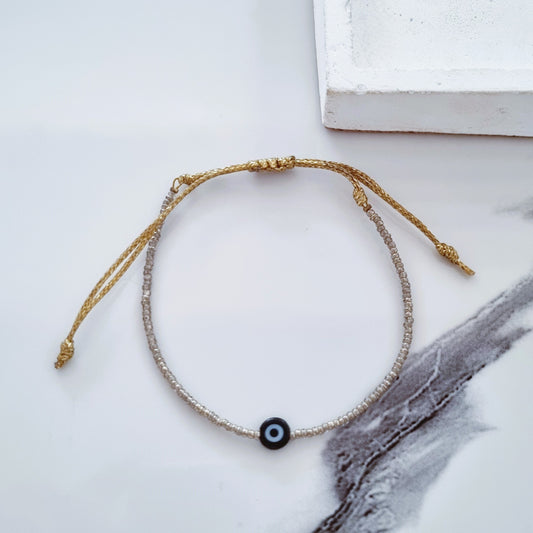 Gold and eye bracelet