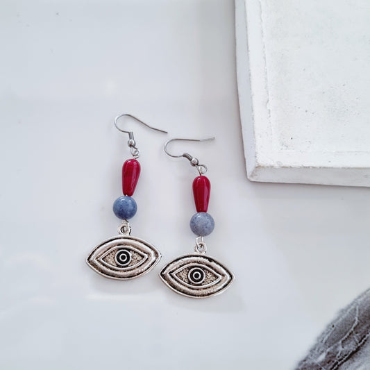 Silver eye earrings