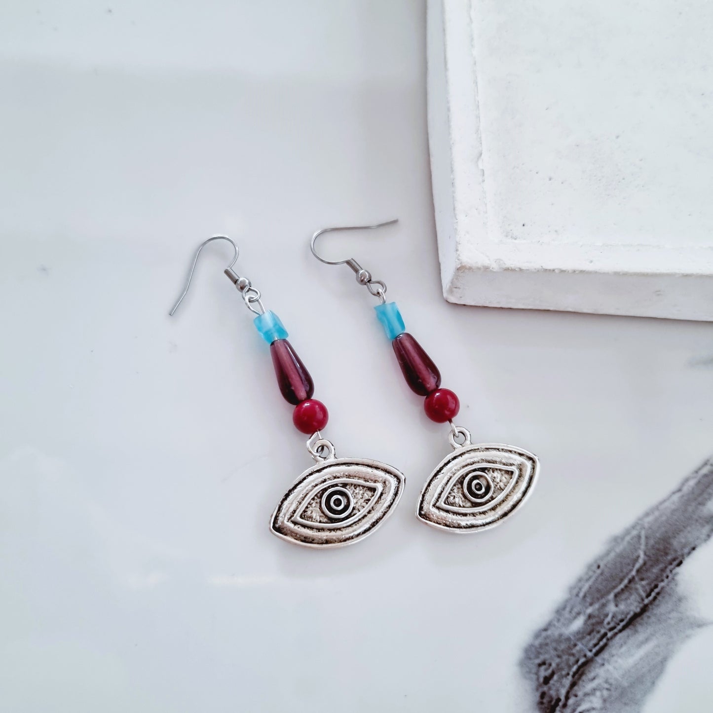 Silver eye earrings 3