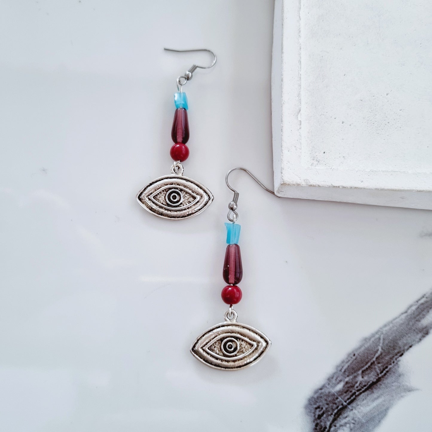 Silver eye earrings 3