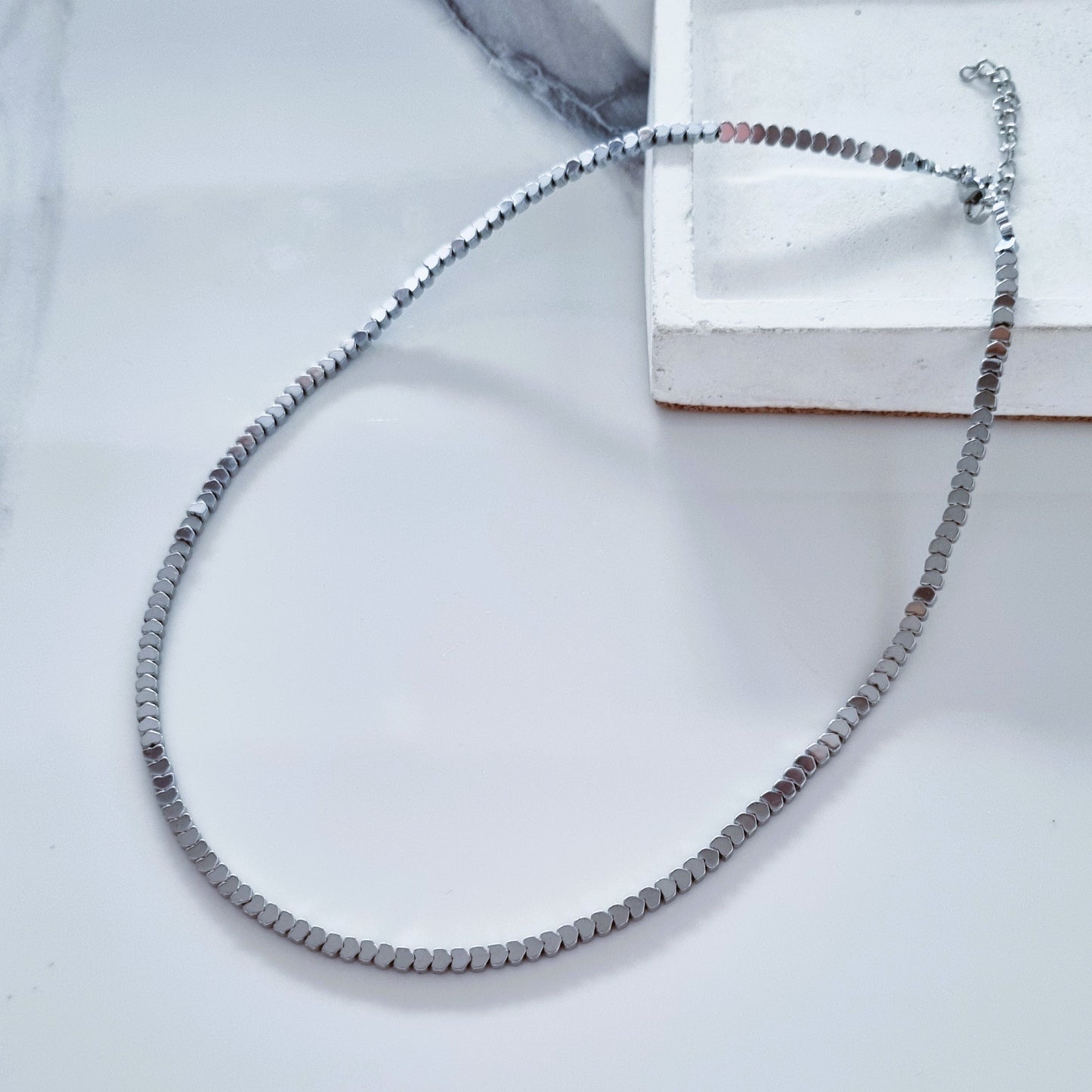 Tiny silver hearts necklace