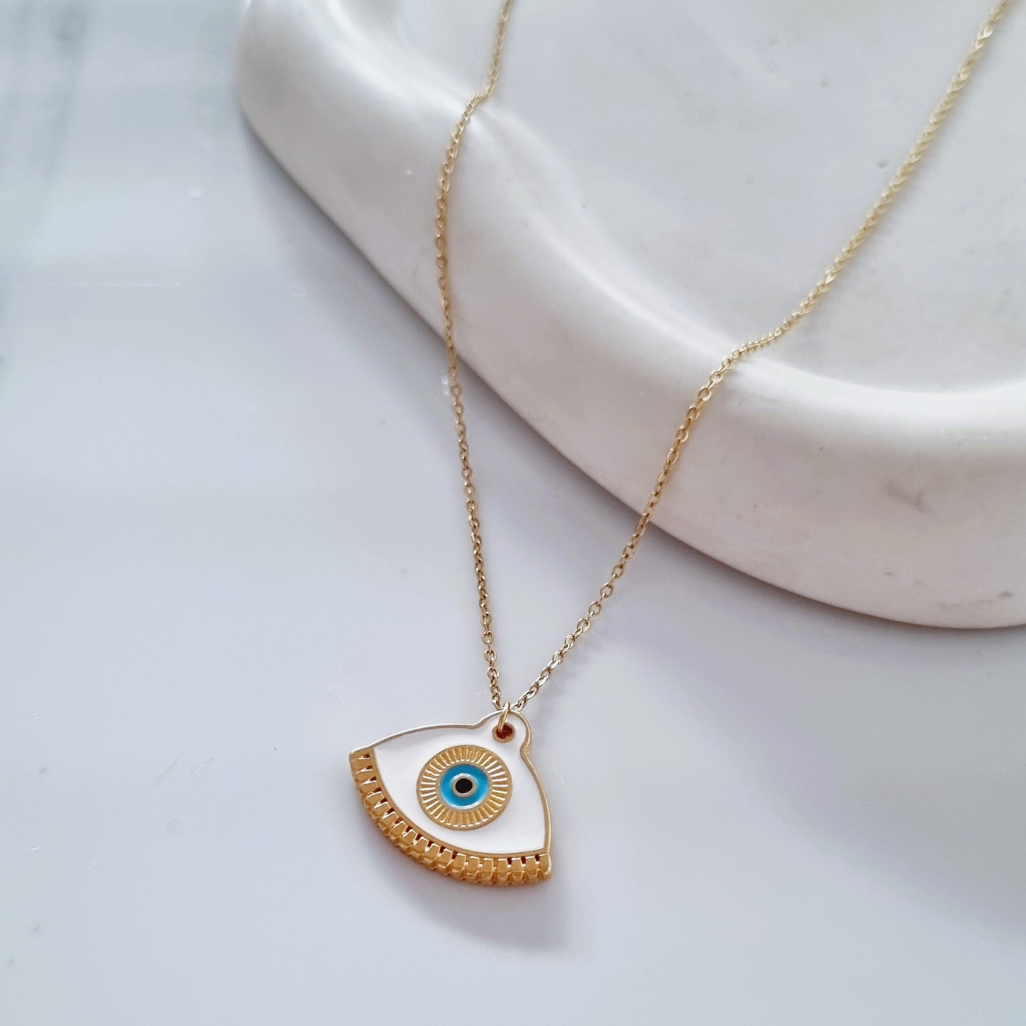 White eye necklace